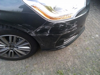 a damaged bumper of a car