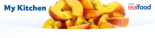 a close-up of a pile of peaches