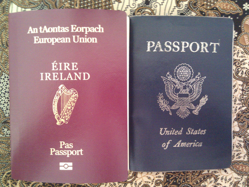 two passports on a patterned surface