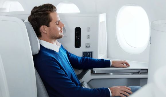 a man sitting in an airplane