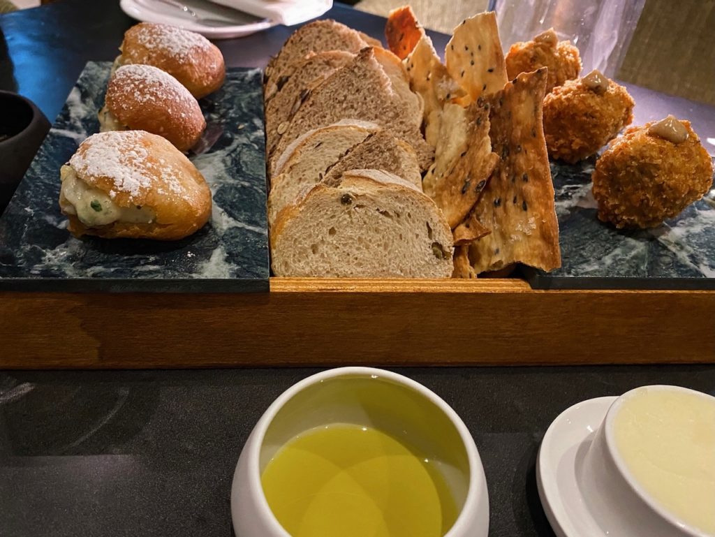 a tray of bread and pastries